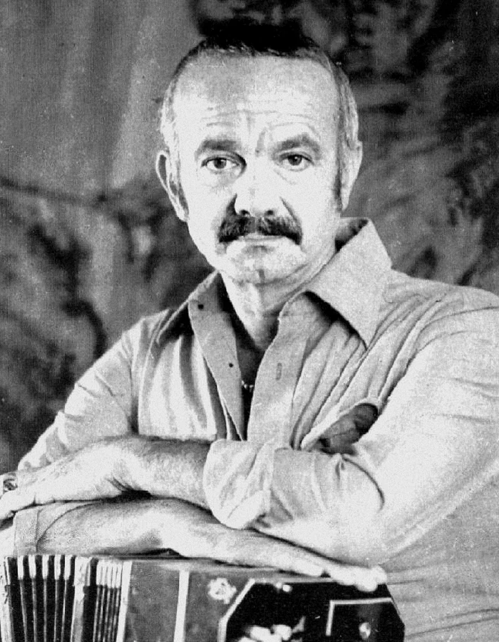 A black-and-white 1971 portrait of Astor Piazzolla holding his bandoneon